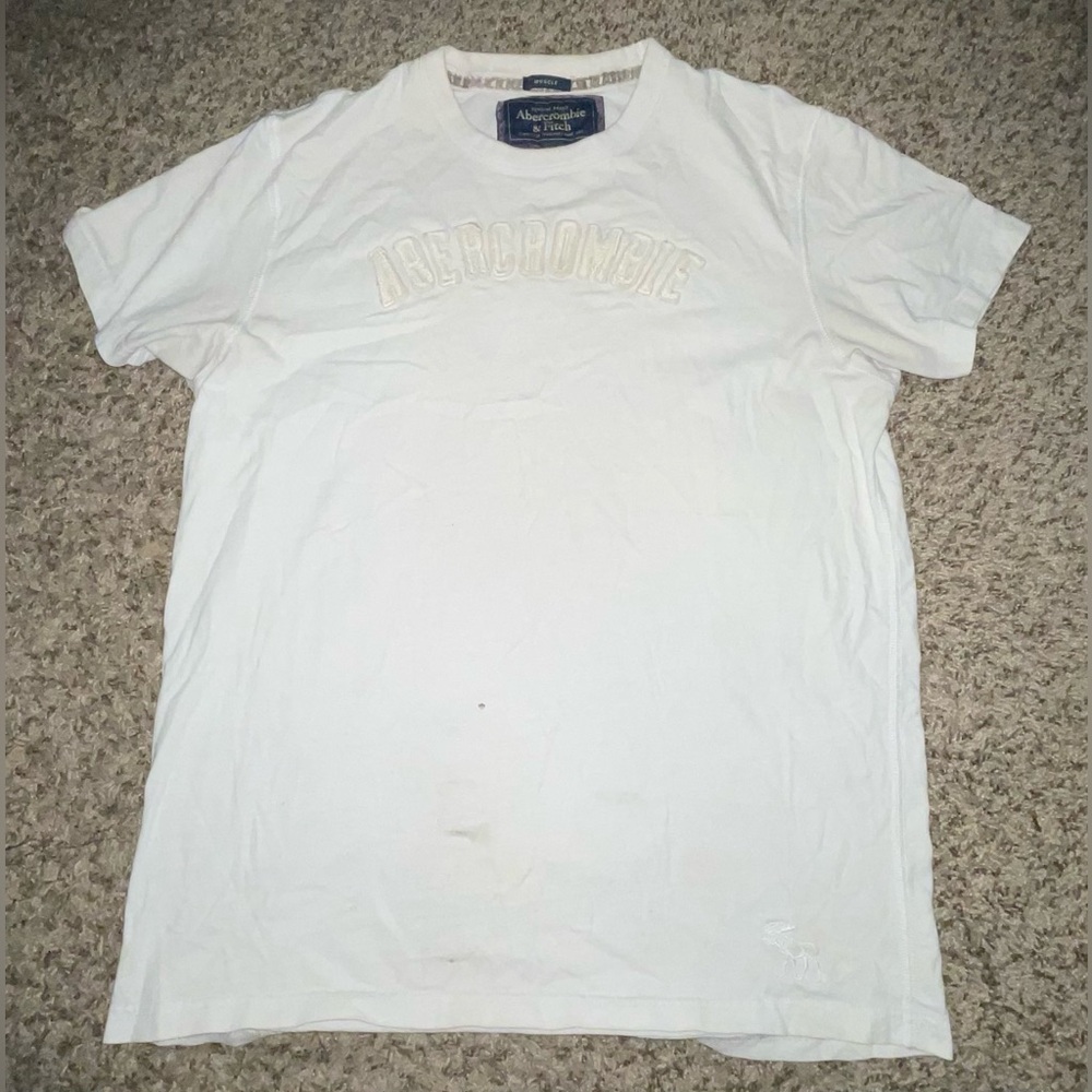 XL Abercrombie & Fitch, white tee with letter stitching 
lightly stained